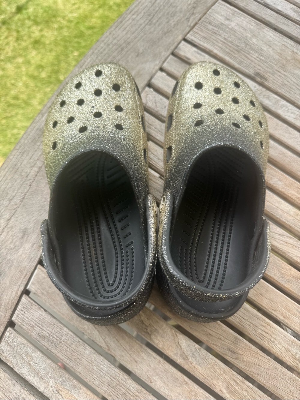 Women’s size 8 gold glitter/black Crocs
